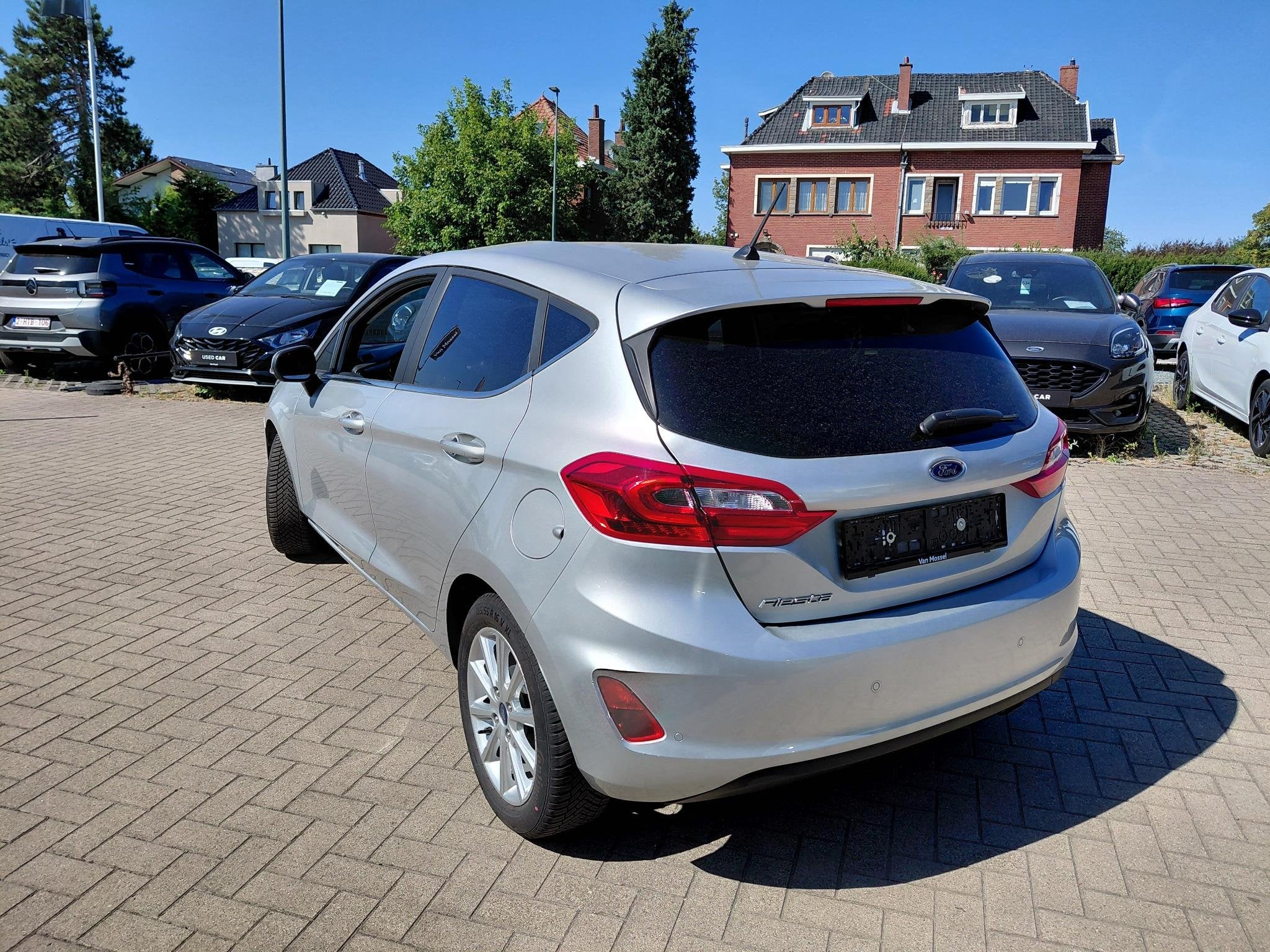 Ford Fiesta 1.1i 63kW Titanium, Auto's, Ford, Voorwielaandrijving, Stof, Automatische klimaatregeling, https://public.car-pass.be/vhr/b7b5220b-9bd7-4663-adda-66510f6b10d3