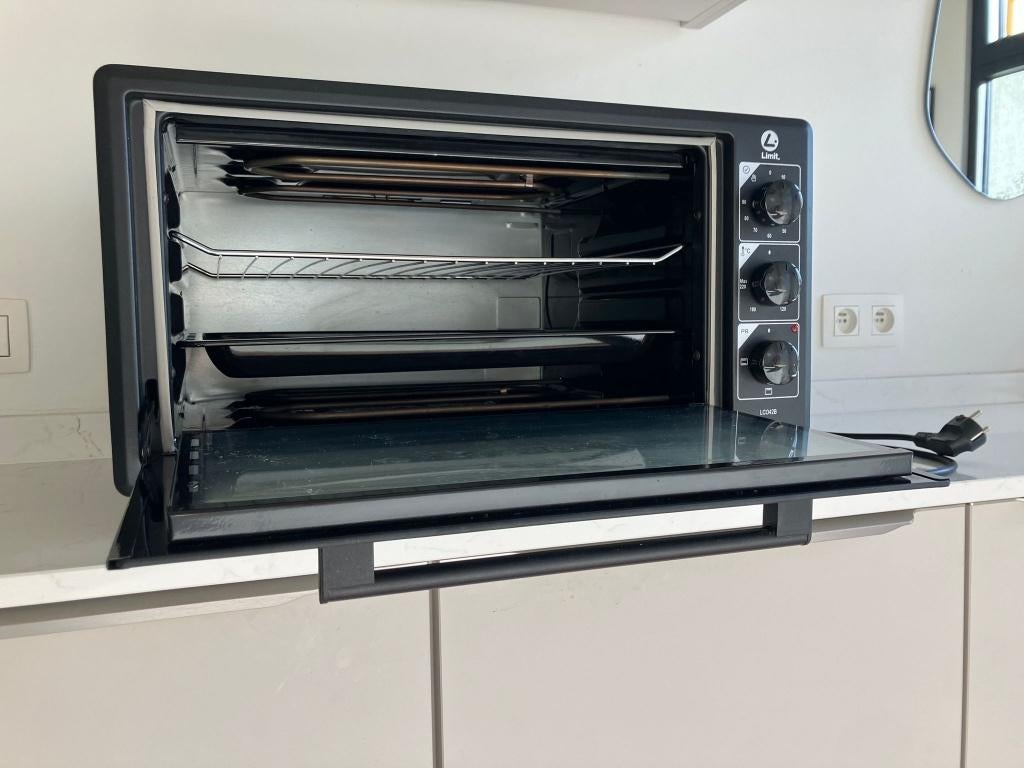 Vrijstaande oven 58x29 cm (buitenafmetingen), Ophalen, Minder dan 45 cm, Gebruikt, Oven
