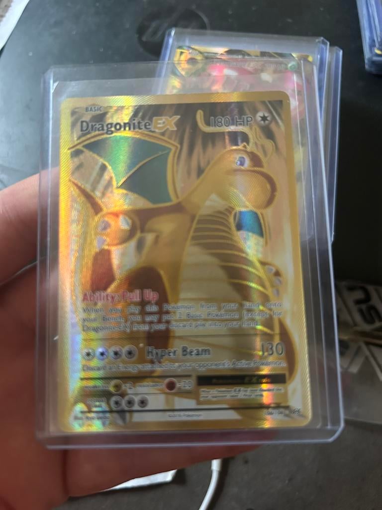 Dragonite ex full art, Ophalen of Verzenden, Zo goed als nieuw, Losse kaart, Foil