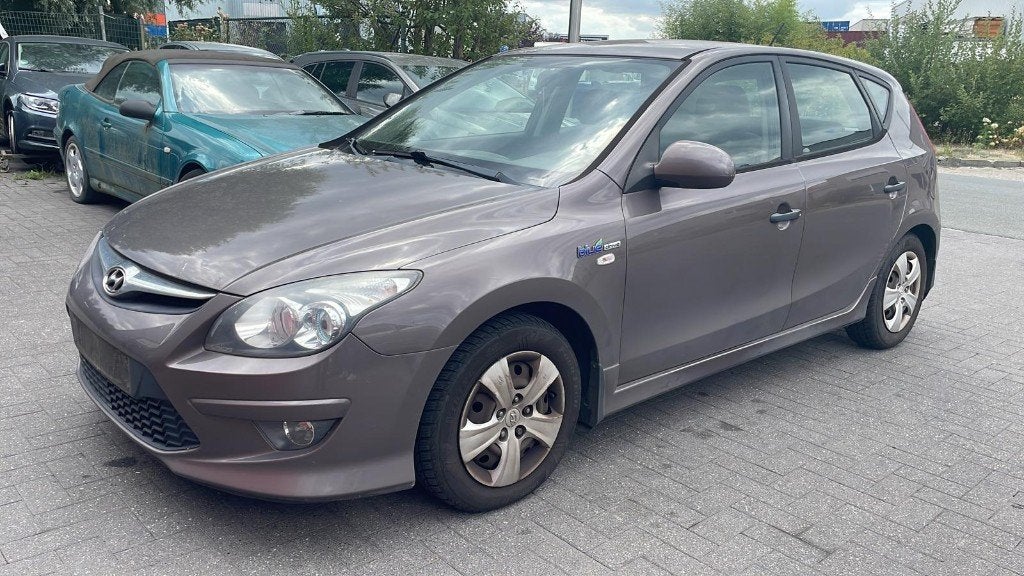 Hyundai i30 1.6 diesel bj 2011 209000 km export, Auto's, Stof, Zwart, 4 cilinders, Bruin