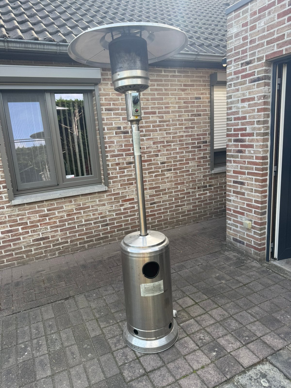 Inox terrasverwarmer op gas met wieltjes, Tuin en Terras, Ophalen, Zo goed als nieuw, Waterbestendig, Vloer