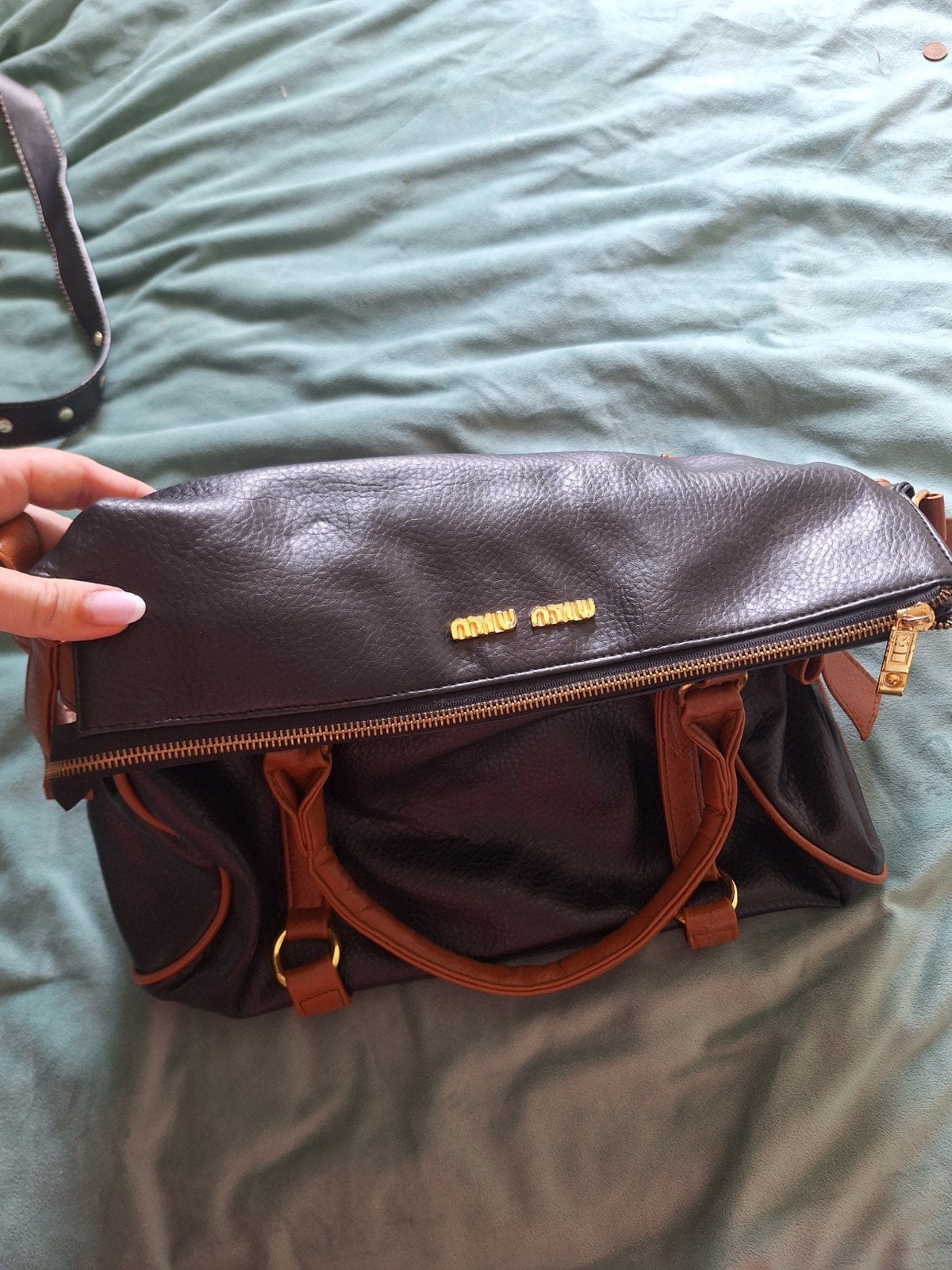 Miu Miu handtas, Ophalen