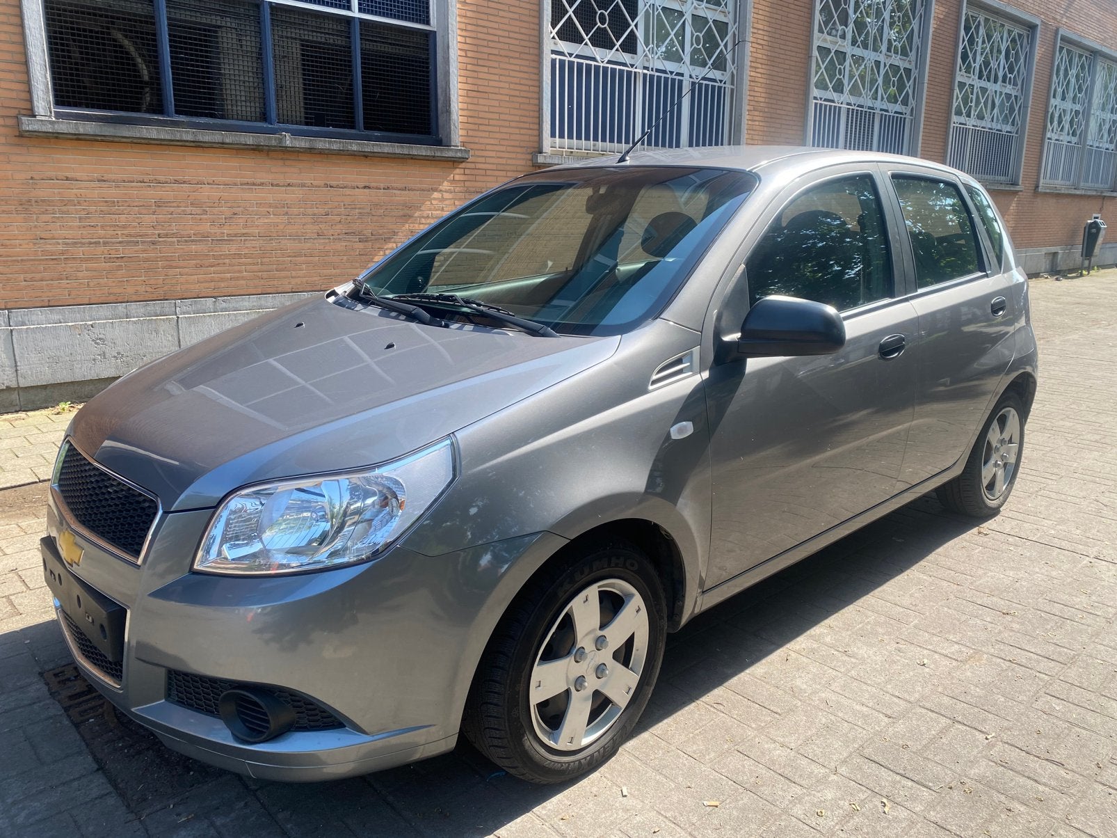 Chevrolet Aveo 1.2 Benzine* 55.000 km*, Auto's, Chevrolet, Bedrijf, 5 deurs, Euro 4, Zilver of Grijs