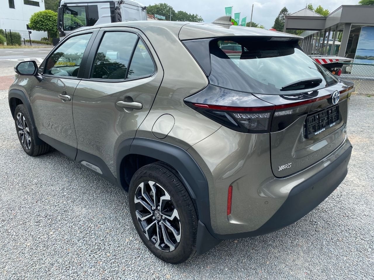 Toyota Yaris Cross Hybrid FWD Adventure MET GARANTIE, Auto's, Toyota, Stof, Gebruikt, Euro 6, 1490 cc