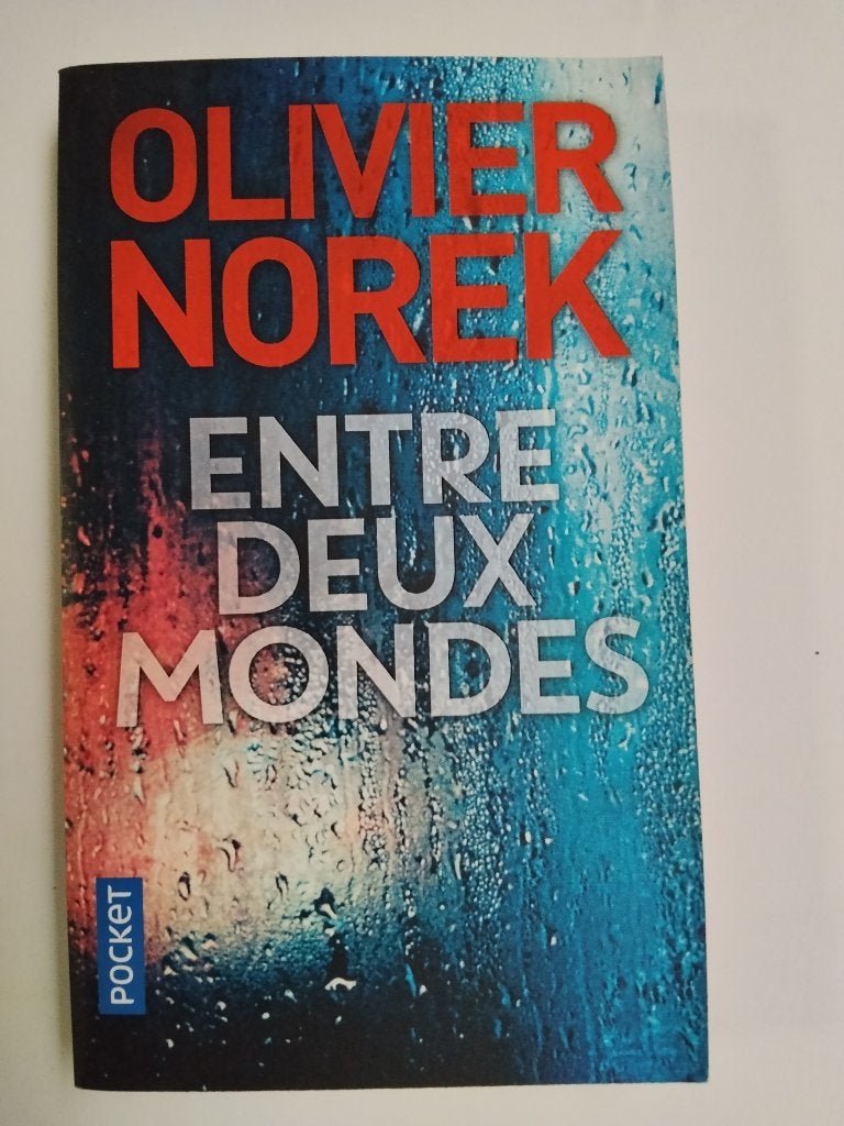 Entre deux mondes - Olivier Norek, Ophalen of Verzenden, Gelezen