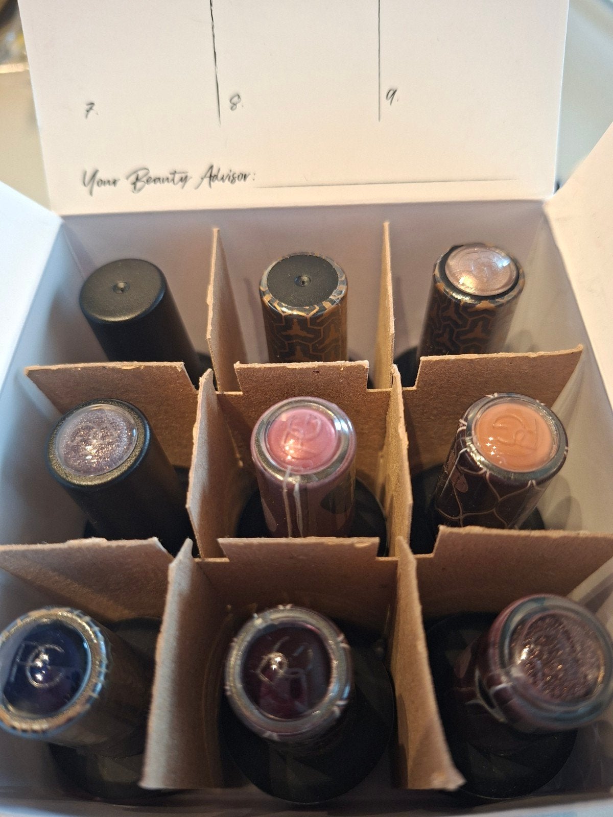 Doosje met 9 flesjes Pinc gellac en stickers, Ophalen