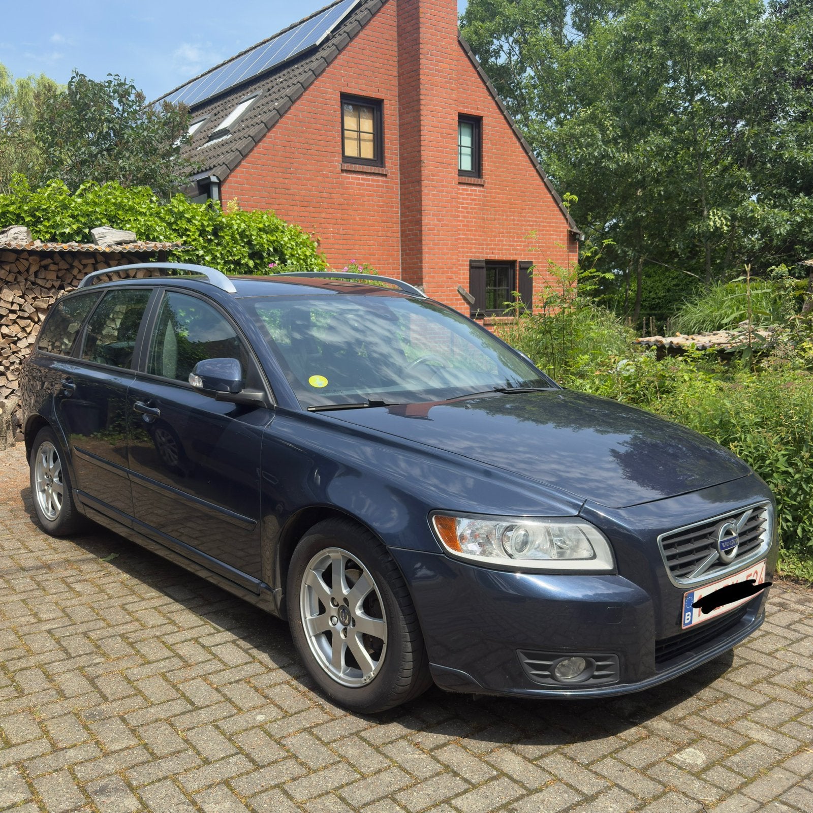 Mooie Volvo V50 1.6 diesel met veel opties, Euro 5, Zwart, Blauw, Leder