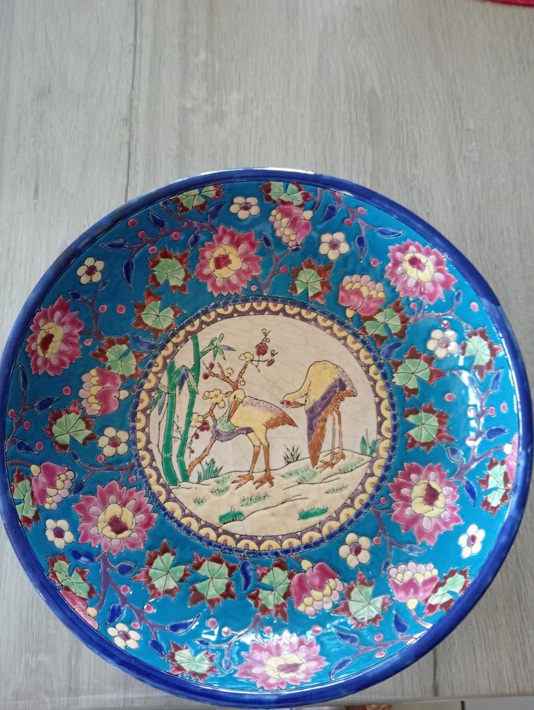 Plat ancien en émaux de Louvière, Enlèvement