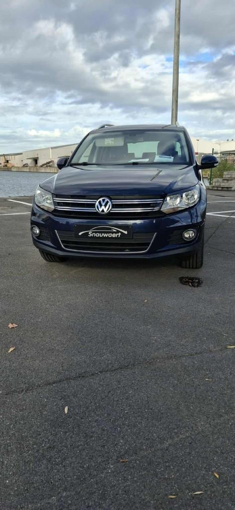 Volkswagen Tiguan Sport & Style BMT (bj 2015), Auto's, Gebruikt, Blauw, Tiguan, 1390 cc