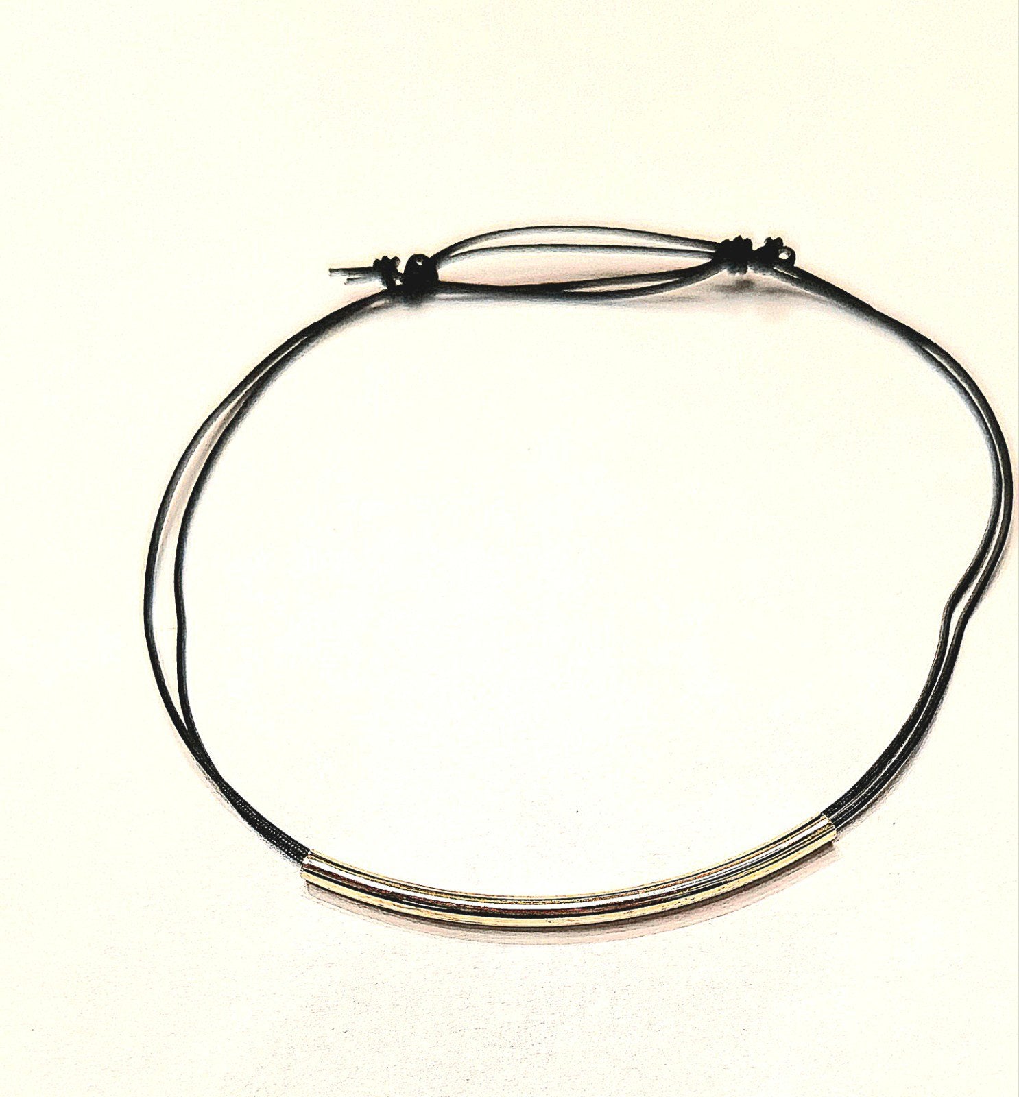 Nieuw En Ongedragen Elegante Gouden Buis-Armband, Ophalen of Verzenden, Nieuw, Zwart, Goud