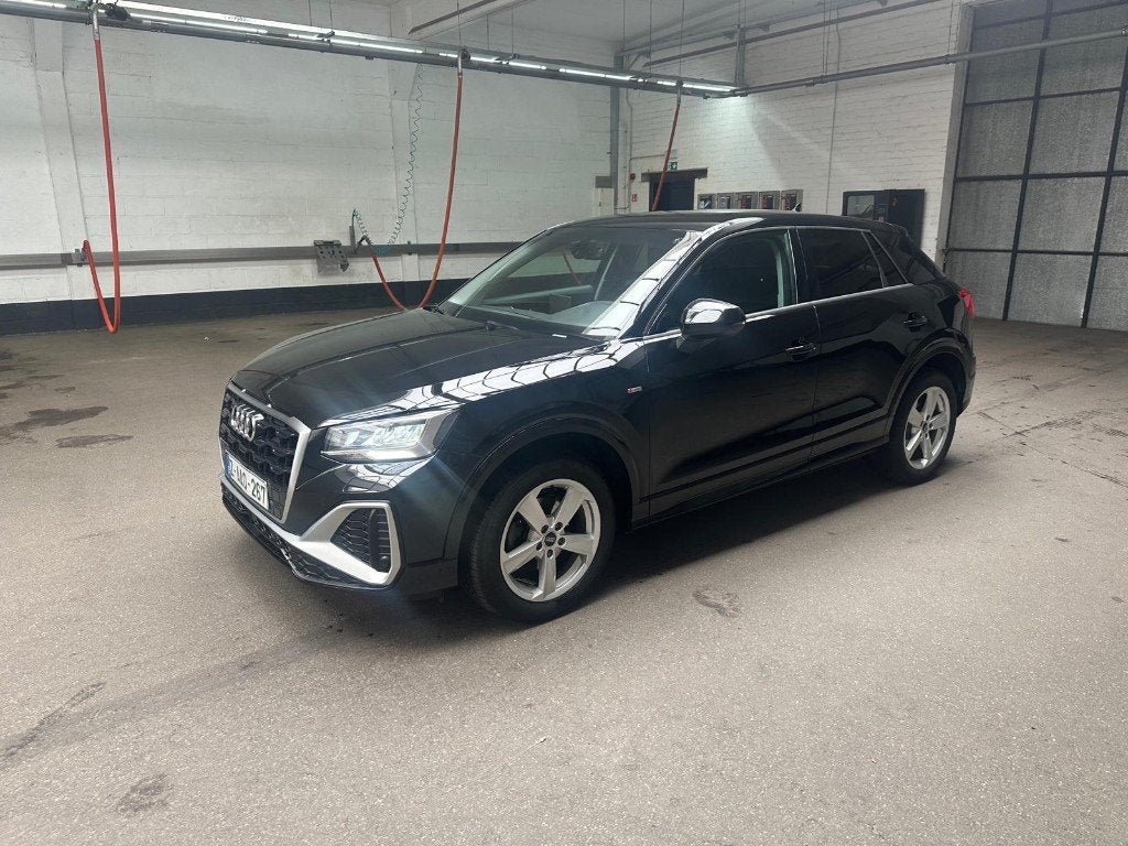 Audi Q2 S-Line 1.5 benzine 150pk automaat, Auto's, 1380 kg, 4 cilinders, Zwart, 5 zetels