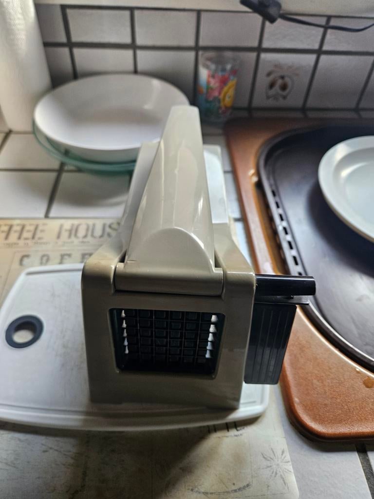 Patatten snijder voor frietjes, Ophalen