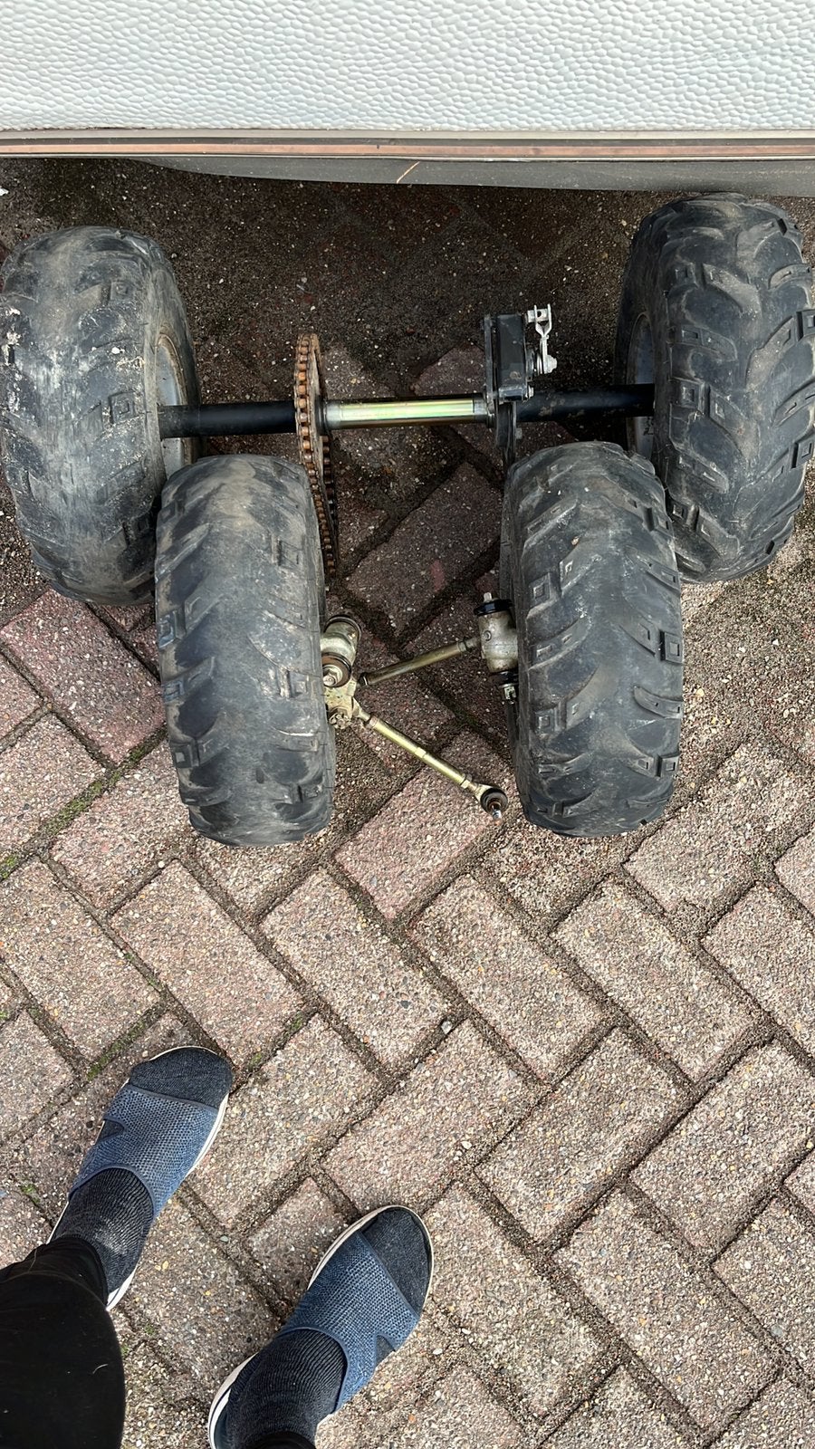 Quad wielen met as