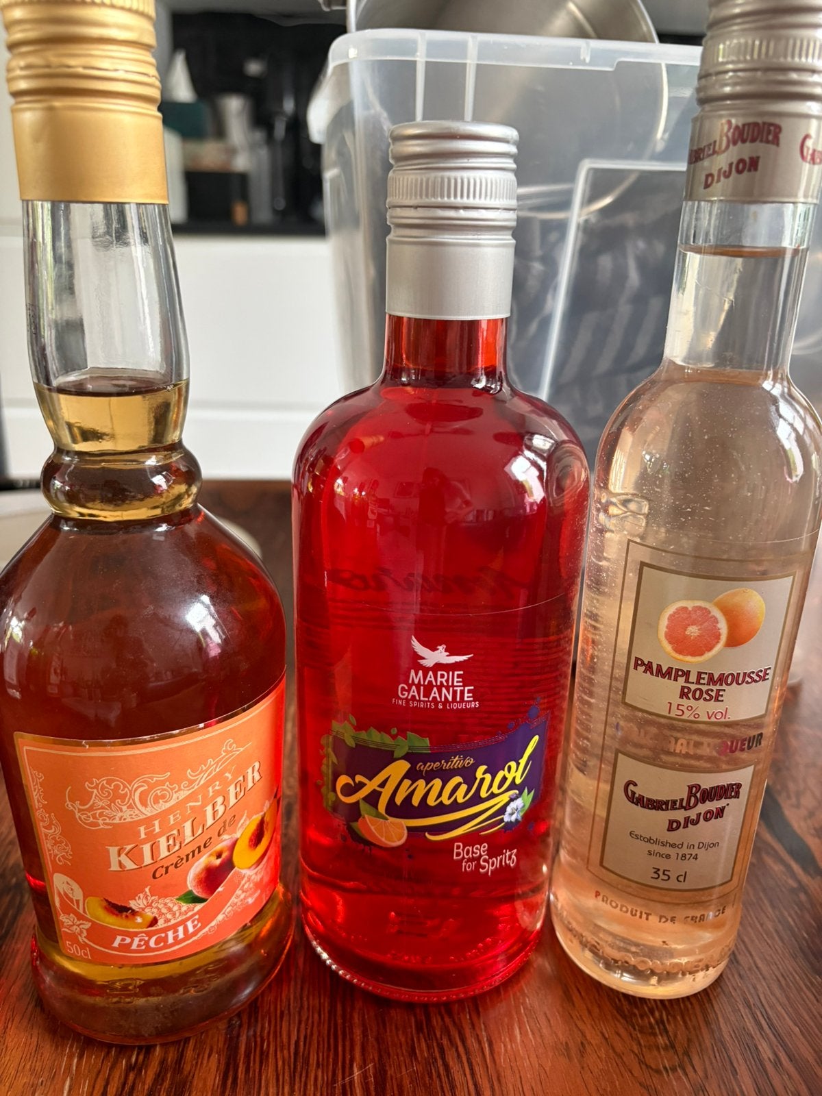 Likeur van perzik en spritz en likeur van pompelmoes, Ophalen, Zo goed als nieuw