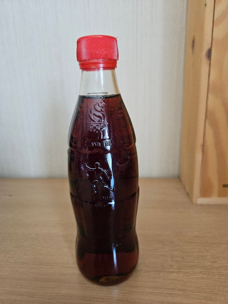 Flesje Coca-Cola uit 1997, Enlèvement