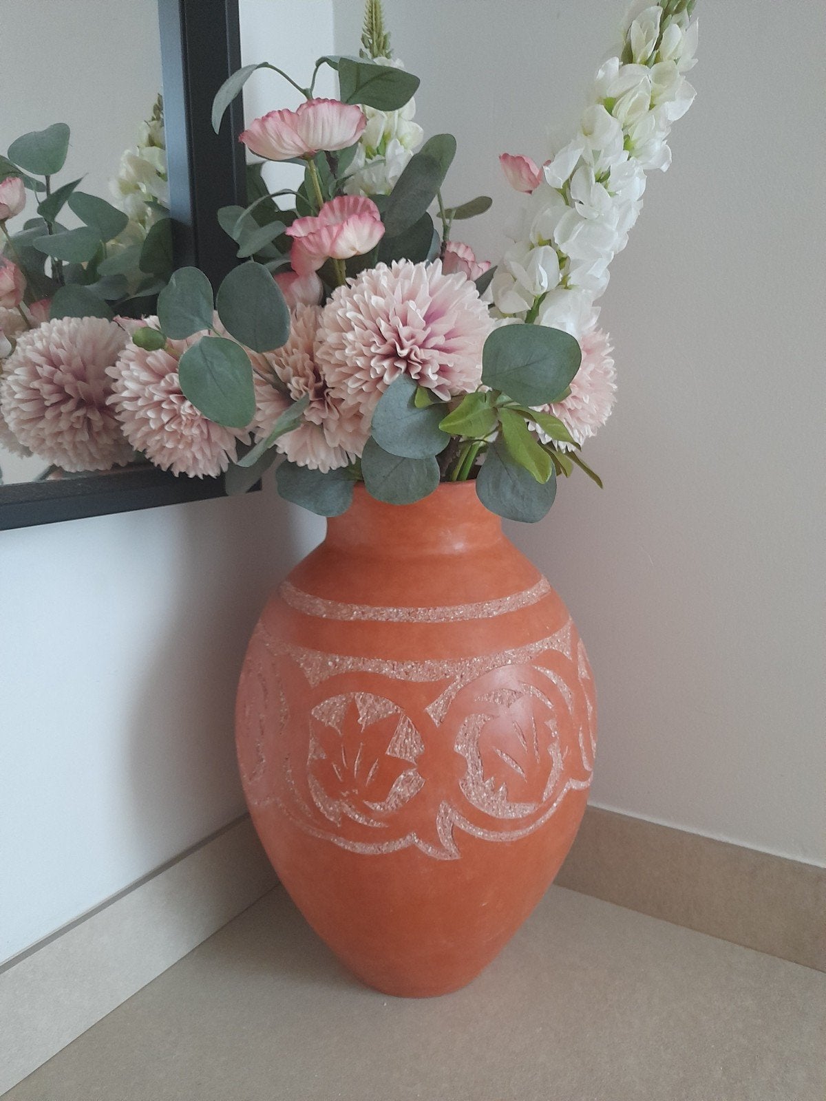 Terracotta vaas, Ophalen
