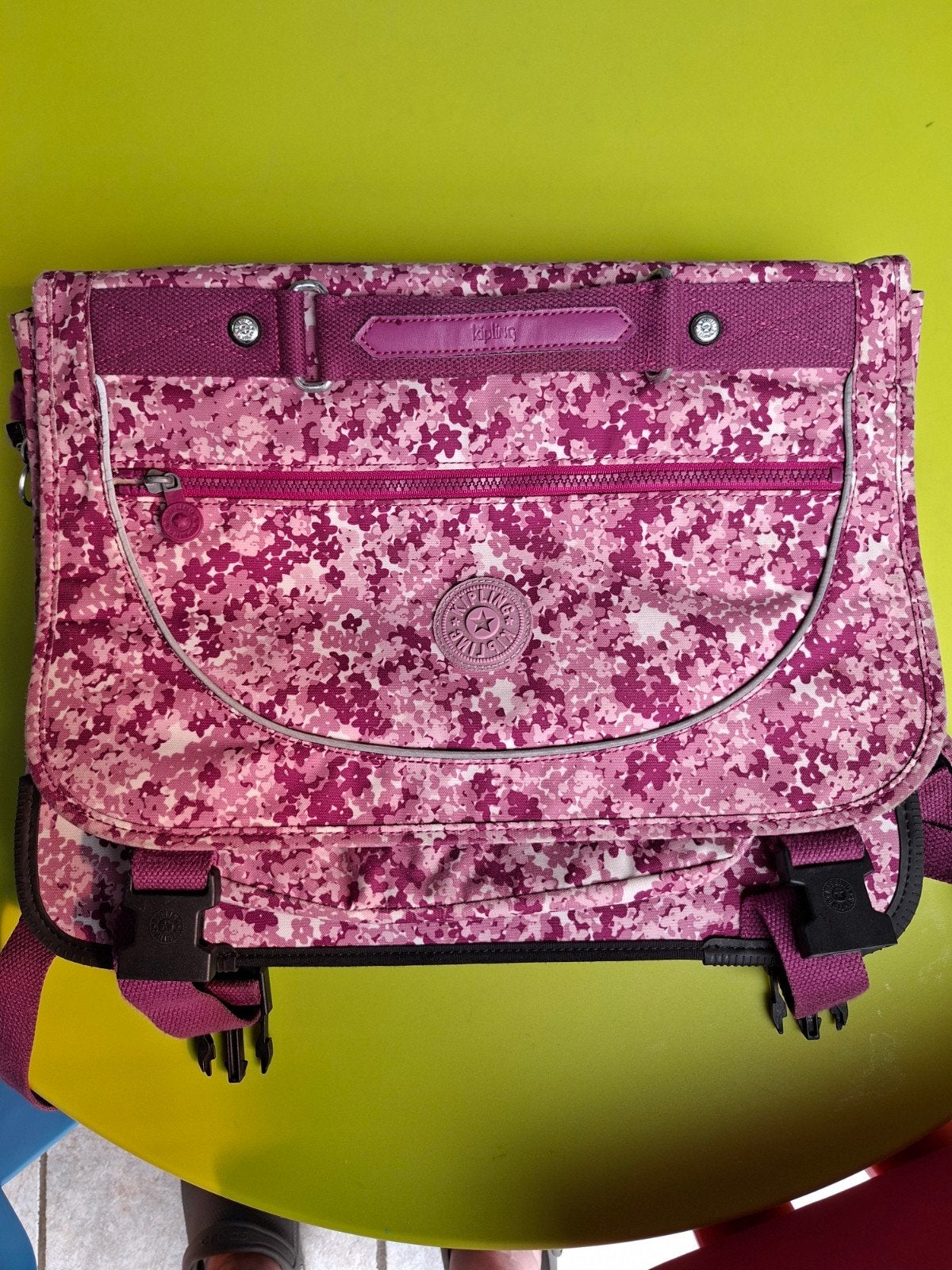 kipling boekentas, Ophalen