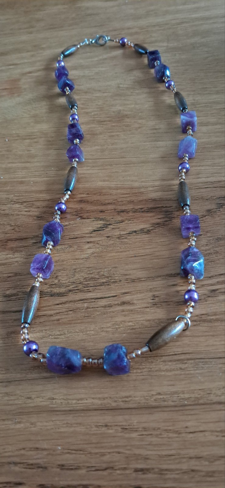 Collier avec pierres améthystes, Enlèvement ou Envoi