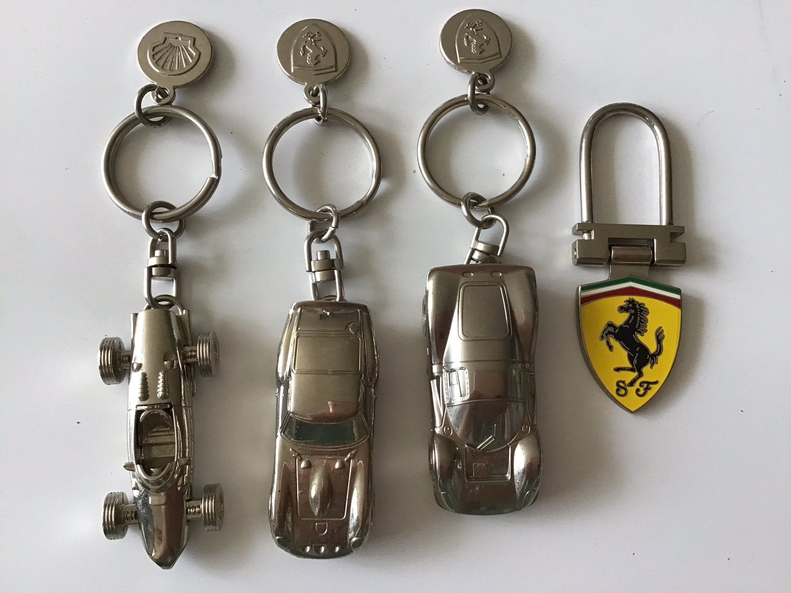 Lot de 4 porte-clés Ferrari, Antiquités & Art, Enlèvement ou Envoi