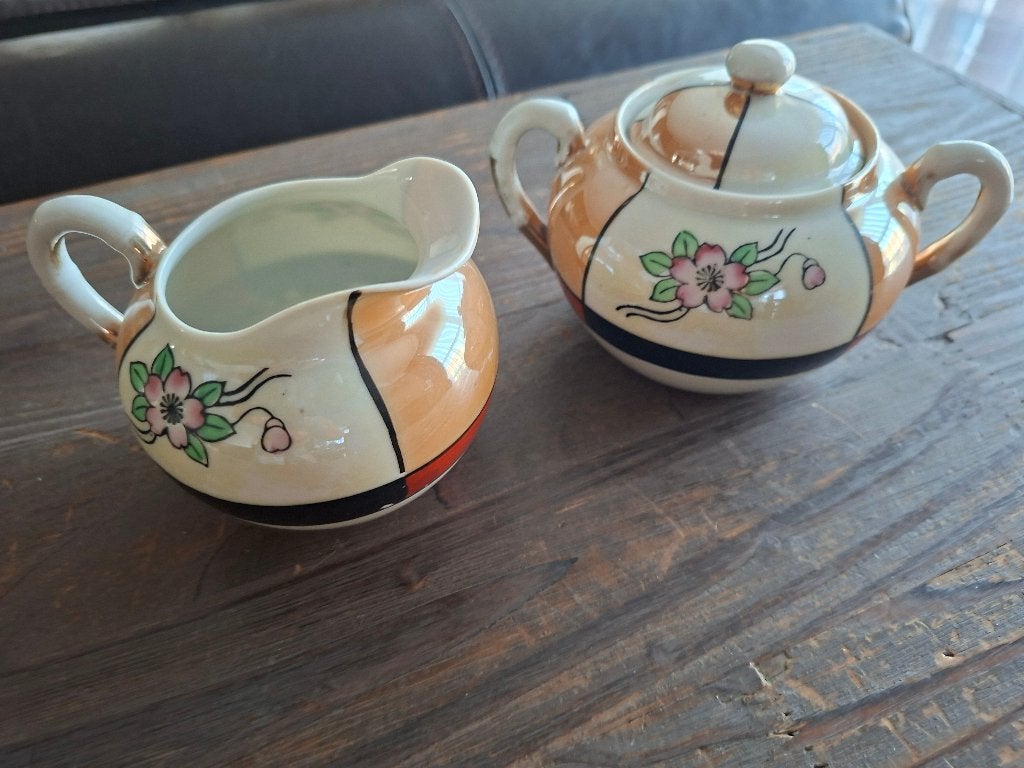 Bisquit suikerpot en melkkan, Ophalen