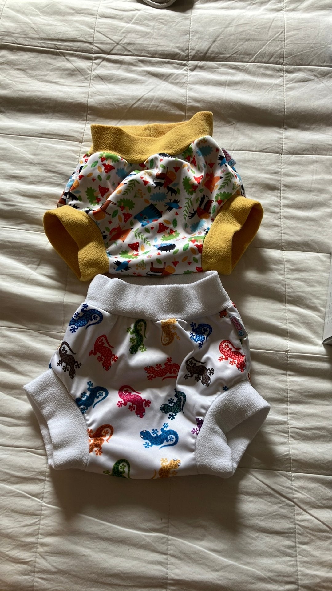 2 couvre-couches Petit Lulu taille L, Enfants & Bébés, Enlèvement, Comme neuf