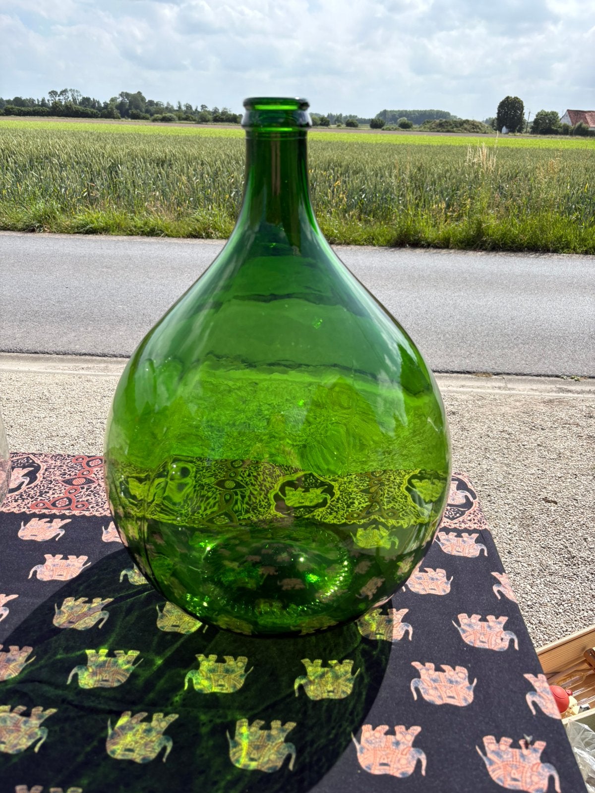 Wijnfles 25 liter, Ophalen