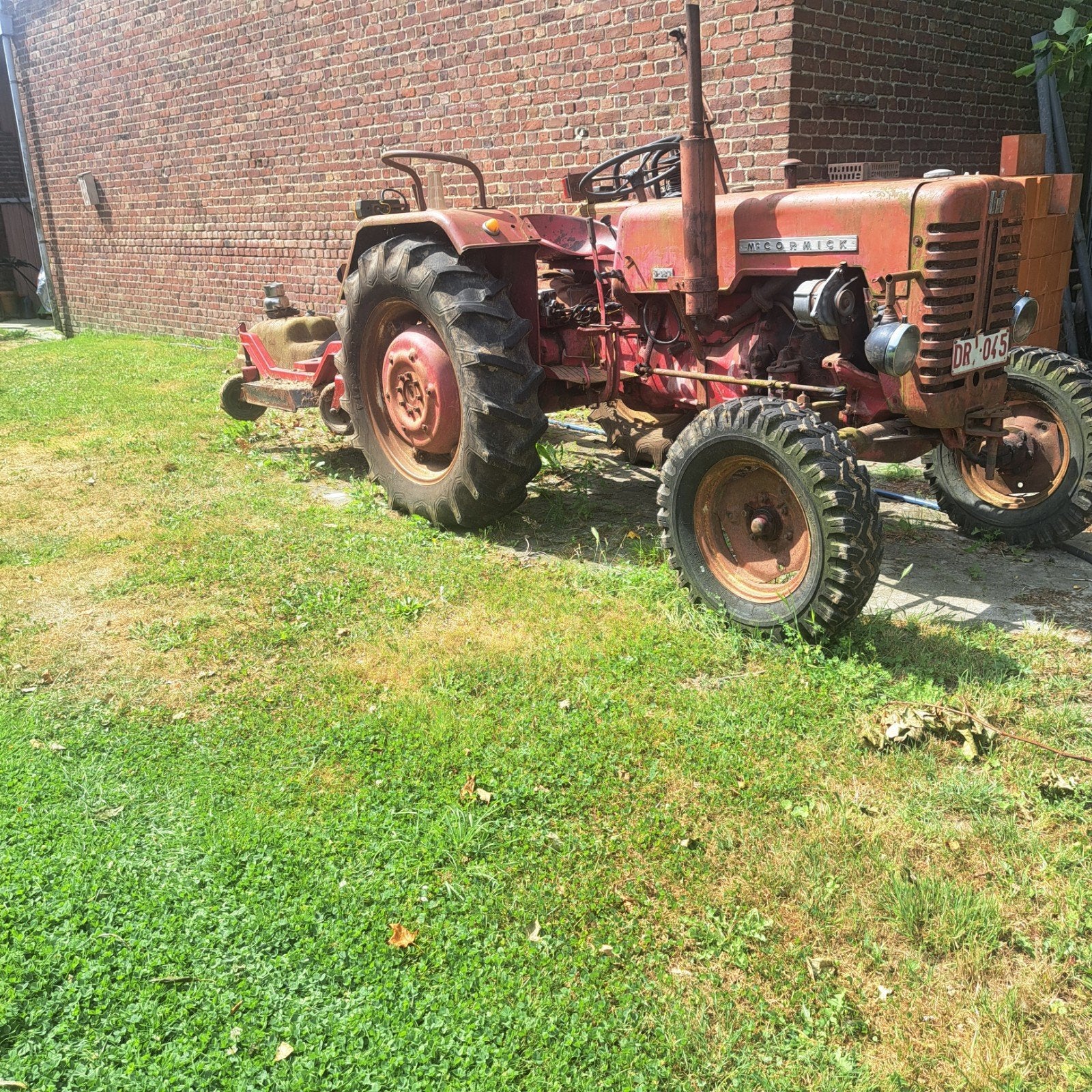 Mccormick D320 met maaier, Enlèvement, McCormick