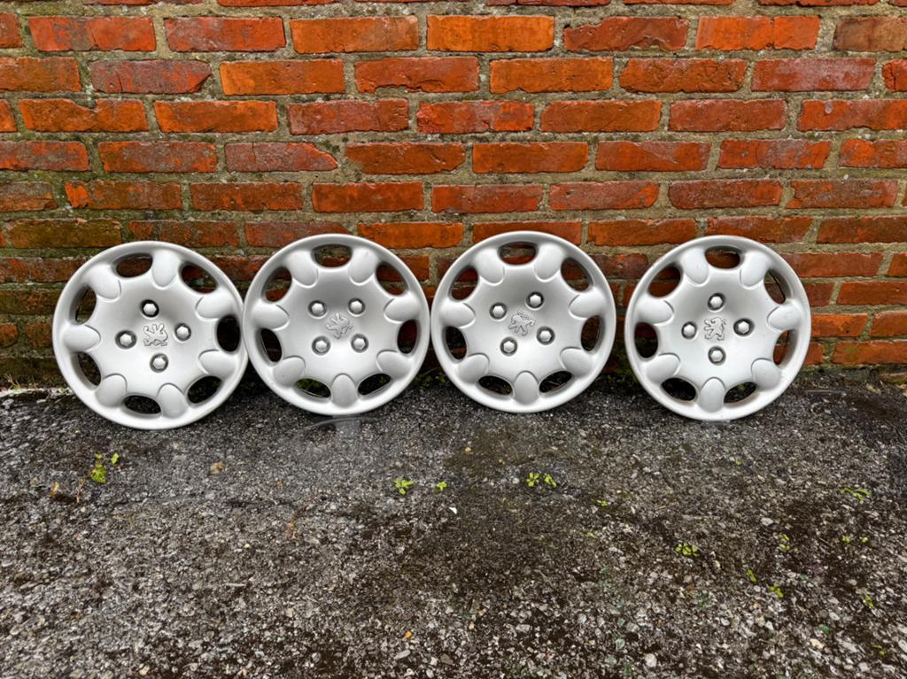 Peugeut plastieke velgen, Ophalen, Zo goed als nieuw