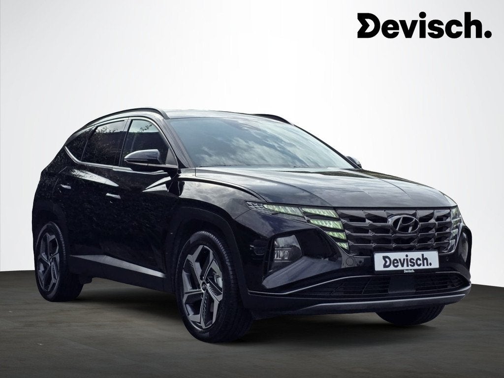 Hyundai Tucson HEV 1.6 T-GDi A/T LIMITED EDITION (bj 2024), Auto's, Automaat, 4 zetels, Stof, Gebruikt