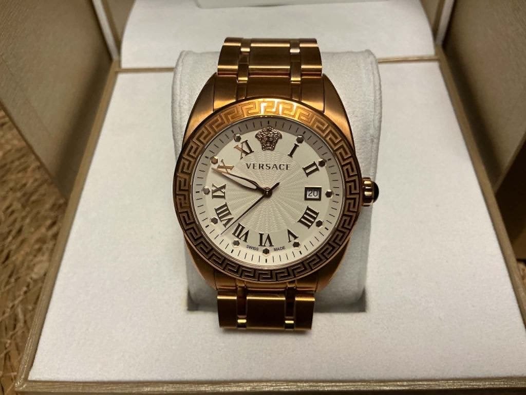 Goudkleurige heren horloge van versace, nooit gedragen., Overige materialen, Polshorloge, Overige materialen, Zo goed als nieuw