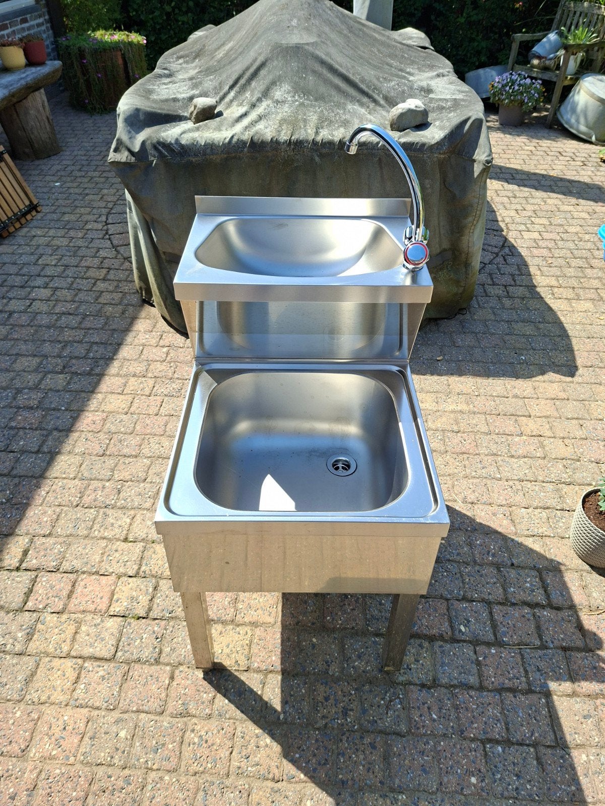 Nieuwe spoelbak inox, Ophalen