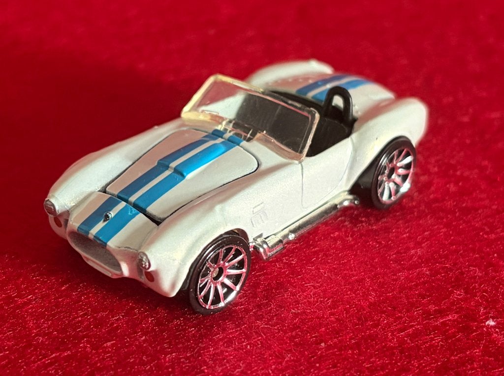 Zeldzame Hot Wheels Shelby Cobra 1:64, Hobby en Vrije tijd, Modelauto's | Overige schalen, Ophalen of Verzenden, Zo goed als nieuw