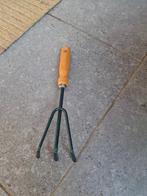 hand gereedschap voor de tuin, Ophalen