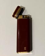 Cartier - aansteker, Ophalen