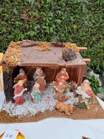 Kerststal met bisquit beelden, Ophalen