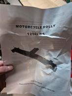 Dolly pour moto neuf !, Enlèvement
