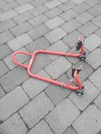 Paddockstand, Motoren, Ophalen