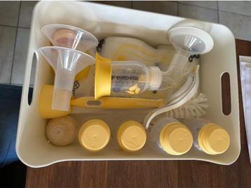 Medela borstkolf + accessoires  beschikbaar voor biedingen