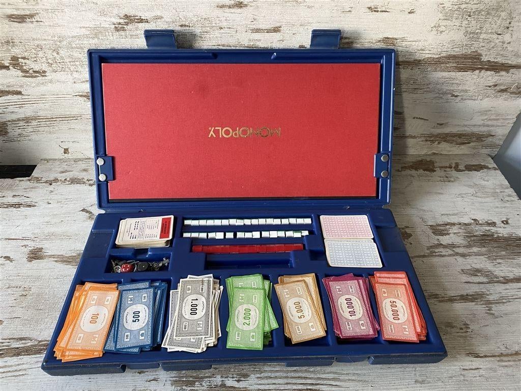 Monopoly clipper in mooie blauwe case [s577], Hobby en Vrije tijd, Gezelschapsspellen | Bordspellen, Zo goed als nieuw, Verzenden