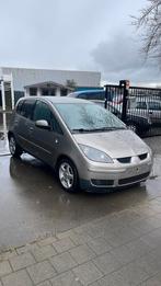 Mitsubishi Colt 1.5 diesel airco 194.000 km airco, Auto's, Voorwielaandrijving, Zwart, 4 cilinders, Bruin