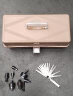 gereedschap in koffer, Enlèvement