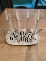 Droogrek voor flessen, Ophalen