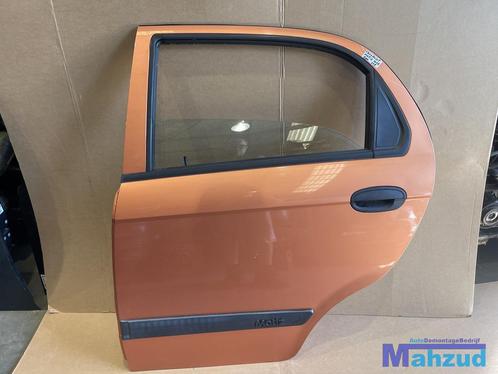 CHEVROLET MATIZ oranje 59U links achter deur slot raam hende, Autos : Pièces & Accessoires, Carrosserie & Tôlerie, Porte, Chevrolet