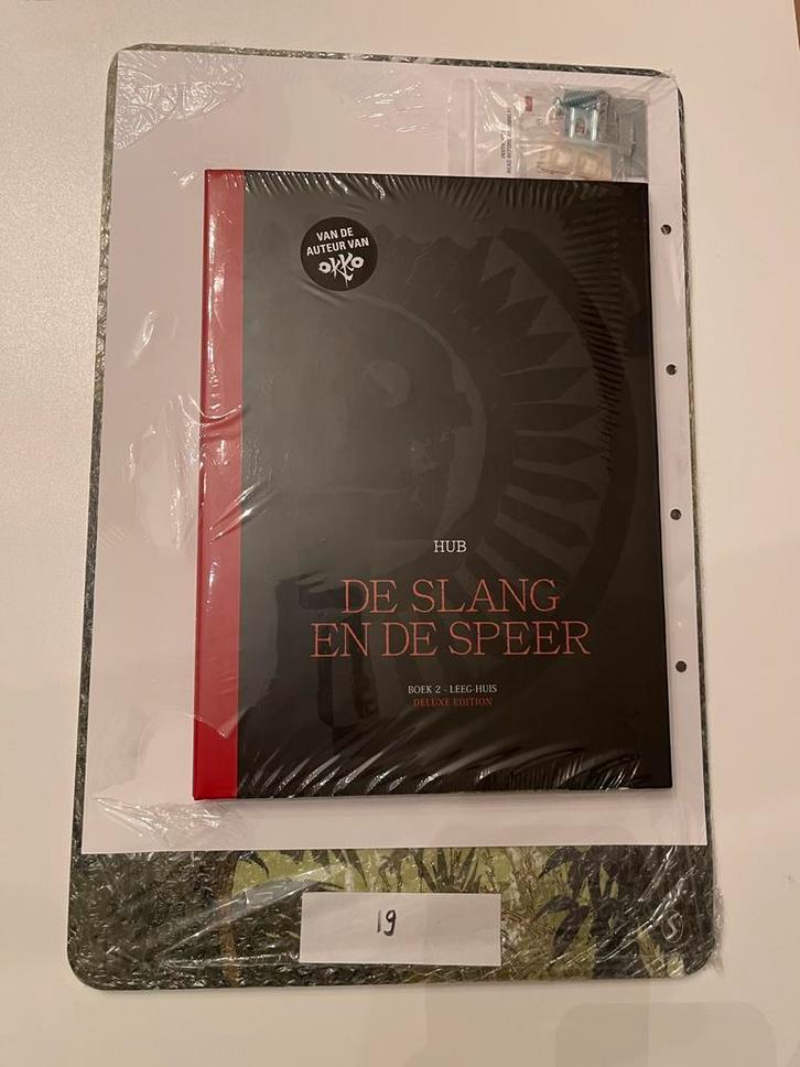 De slang en de speer luxe met wandplaat leeg huis, Boeken, Stripverhalen, Nieuw, Eén stripboek, Ophalen of Verzenden