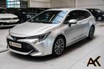 Toyota Corolla SW 1.8 Hybrid Sport GPF e-CVT - NAVI / CAMERA, Auto's, Toyota, Euro 6, 4 cilinders, Bedrijf, Hybride Elektrisch/Benzine