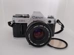 Canon AE1met een Canon 50mm 1:1.8 S.C. lens met uv filter, Audio, Tv en Foto, Ophalen of Verzenden, Zo goed als nieuw, Spiegelreflex