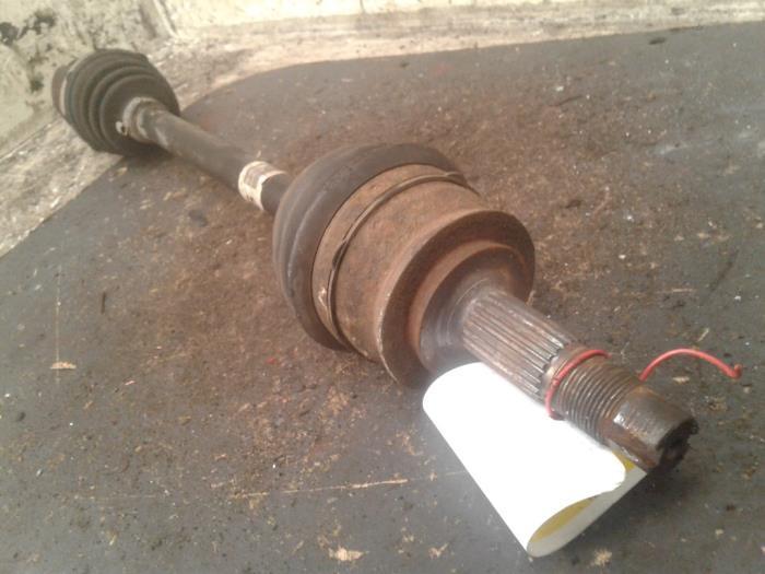 Aandrijfas links-voor van een Opel Corsa, Auto-onderdelen, Remmen en Aandrijving, Opel, Gebruikt, 3 maanden garantie, Ophalen of Verzenden