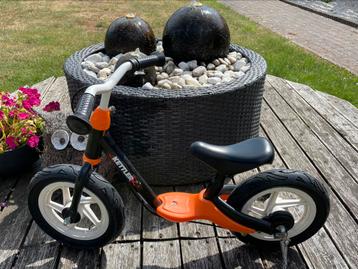 Kettler oranje loopfiets beschikbaar voor biedingen