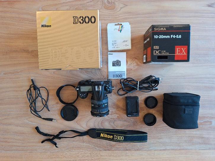 Nikon D300 + Sigma 10-20 mm f/4-5.6 lens + alle toebehoren, Audio, Tv en Foto, Fotocamera's Digitaal, Zo goed als nieuw, Spiegelreflex