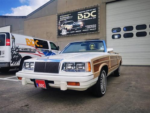 Chrysler Le-Baron woody cabriolet (bj 1986, automaat), Auto's, Oldtimers, Te koop, Elektrische stoelverstelling, Emergency brake assist